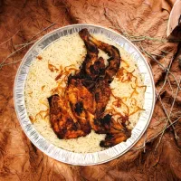 نص حبة دجاج مظبي مع أرز بشاور